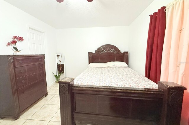 3306 E Chelsea St, Tampa, FL 33610 - bedroom with a ceiling fan and light tile patterned floors