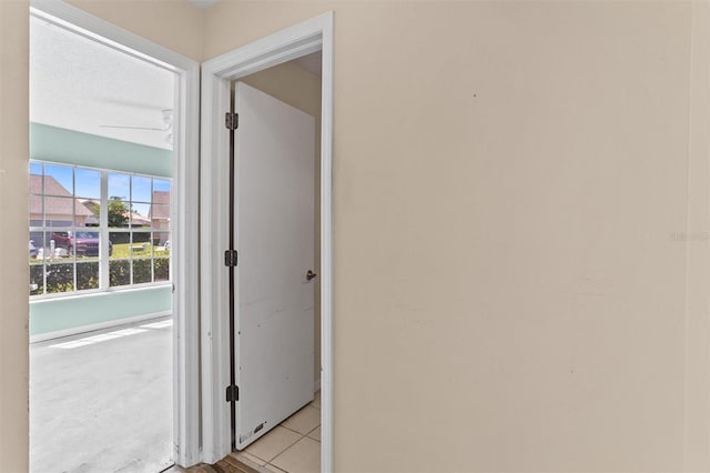 1046 Almondwood Dr, Trinity, FL 34655 - hall featuring light tile patterned flooring