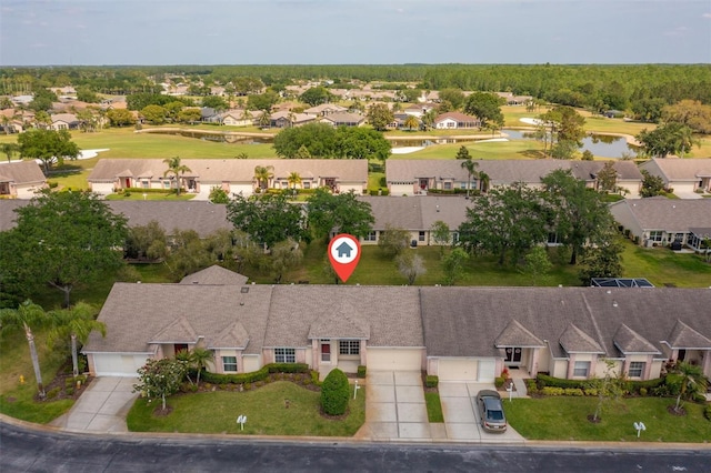 1046 Almondwood Dr, Trinity, FL 34655 - drone / aerial view with a residential view, a water view, and golf course view