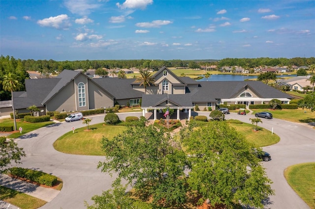 1046 Almondwood Dr, Trinity, FL 34655 - drone / aerial view featuring a water view and a residential view
