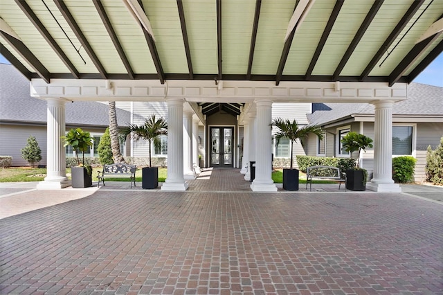 1046 Almondwood Dr, Trinity, FL 34655 - exterior space with covered porch and french doors