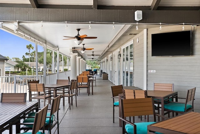 1046 Almondwood Dr, Trinity, FL 34655 - view of patio / terrace featuring a ceiling fan and outdoor dining area