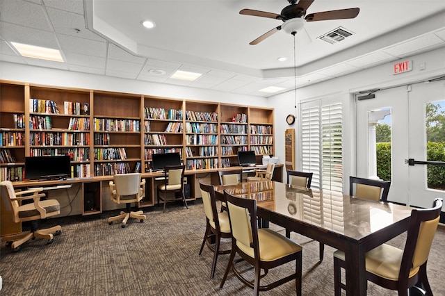 1046 Almondwood Dr, Trinity, FL 34655 - interior space featuring a paneled ceiling, visible vents, ceiling fan, and carpet