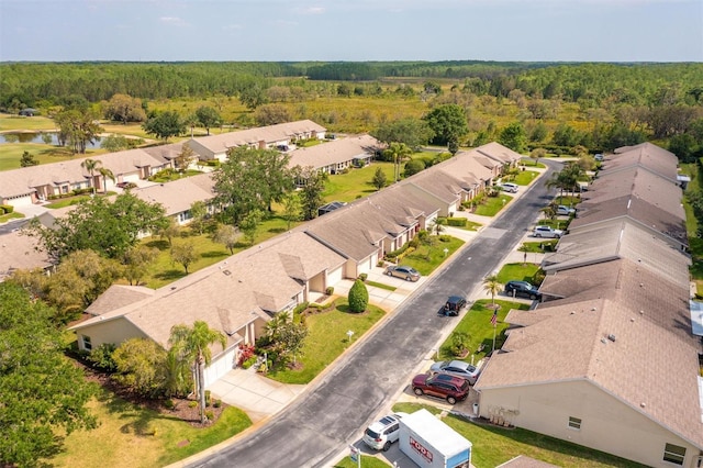 1046 Almondwood Dr, Trinity, FL 34655 - bird's eye view with a residential view, a water view, and a view of trees