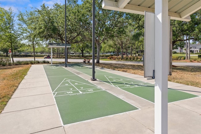 1046 Almondwood Dr, Trinity, FL 34655 - view of home's community featuring shuffleboard