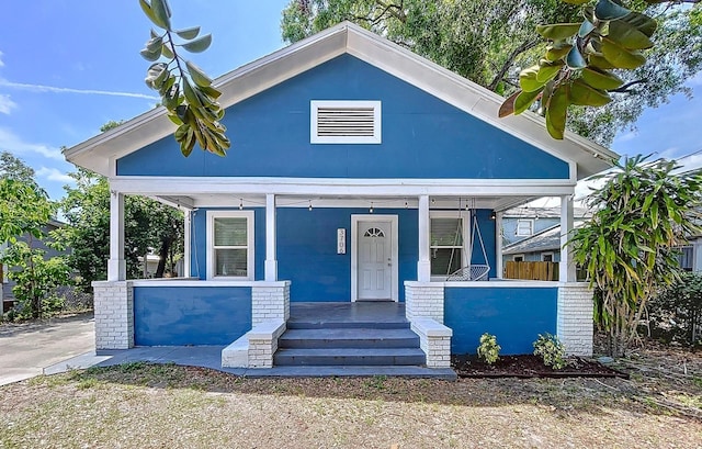 bungalow featuring covered porch