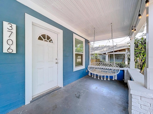 entrance to property with covered porch