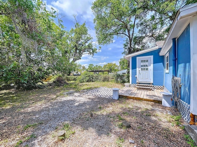 view of yard with a deck