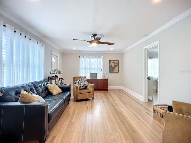 4231 8th St N, Saint Petersburg, FL 33703 - living room with ornamental molding, light wood-style flooring, baseboards, and ceiling fan