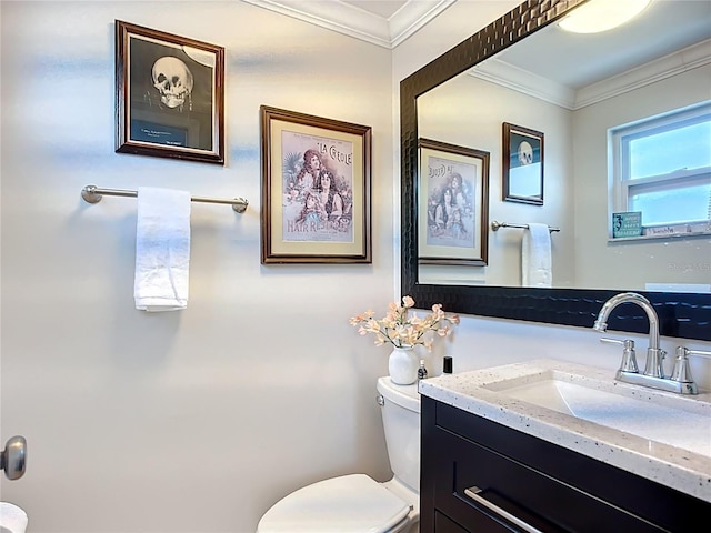 4231 8th St N, Saint Petersburg, FL 33703 - bathroom featuring crown molding, toilet, and vanity