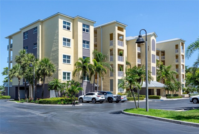 425 150th Ave Unit 2301, Madeira Beach, FL 33708 - view of property with uncovered parking