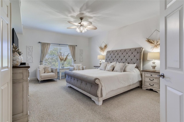 425 150th Ave Unit 2301, Madeira Beach, FL 33708 - bedroom with light colored carpet and a ceiling fan