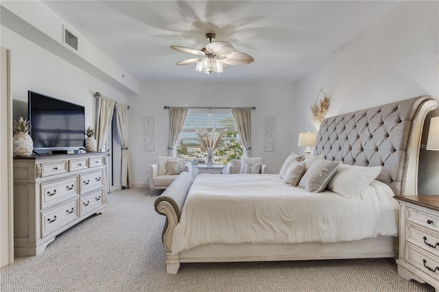 425 150th Ave Unit 2301, Madeira Beach, FL 33708 - bedroom featuring light colored carpet and ceiling fan