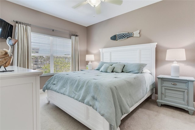 425 150th Ave Unit 2301, Madeira Beach, FL 33708 - bedroom with light carpet and ceiling fan