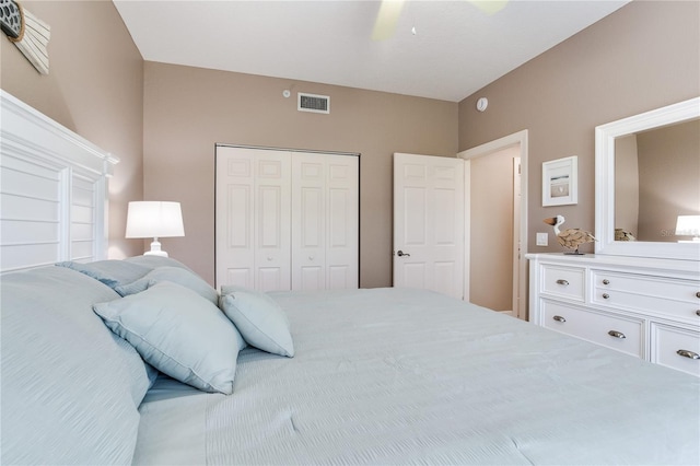 425 150th Ave Unit 2301, Madeira Beach, FL 33708 - bedroom featuring a closet and a ceiling fan