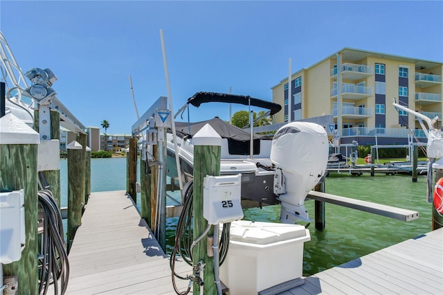 425 150th Ave Unit 2301, Madeira Beach, FL 33708 - dock area featuring boat lift and a water view