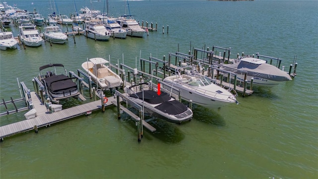 425 150th Ave Unit 2301, Madeira Beach, FL 33708 - dock with boat lift and a water view