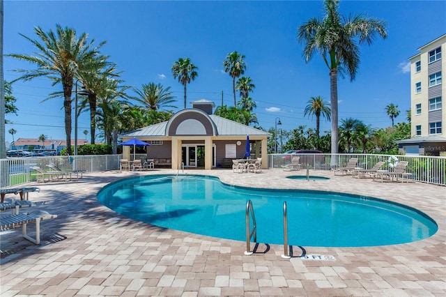 425 150th Ave Unit 2301, Madeira Beach, FL 33708 - community pool featuring a patio and a community hot tub