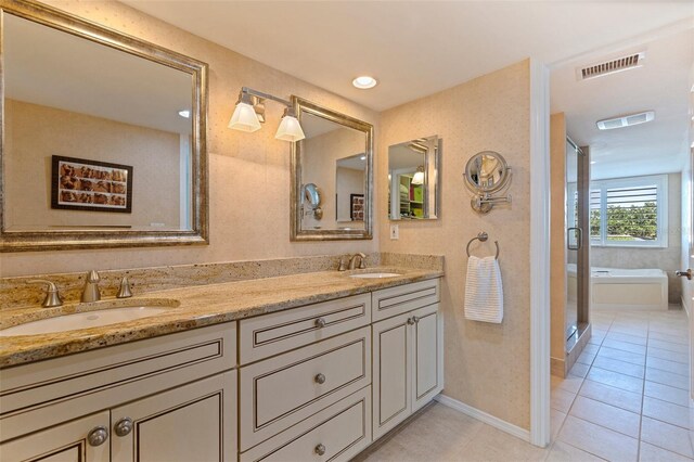 full bath featuring visible vents, tile patterned flooring, and a sink