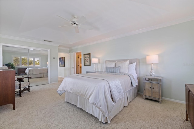 carpeted bedroom with baseboards, visible vents, ceiling fan, and crown molding