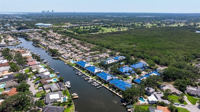 bird's eye view with a water view and a residential view