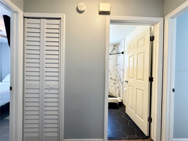 hall featuring tile patterned floors