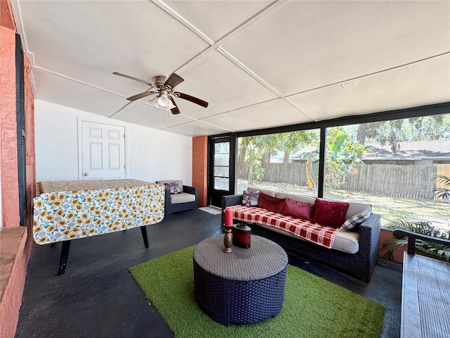 living area with ceiling fan