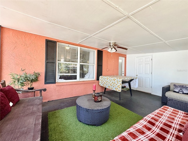 exterior space with a ceiling fan