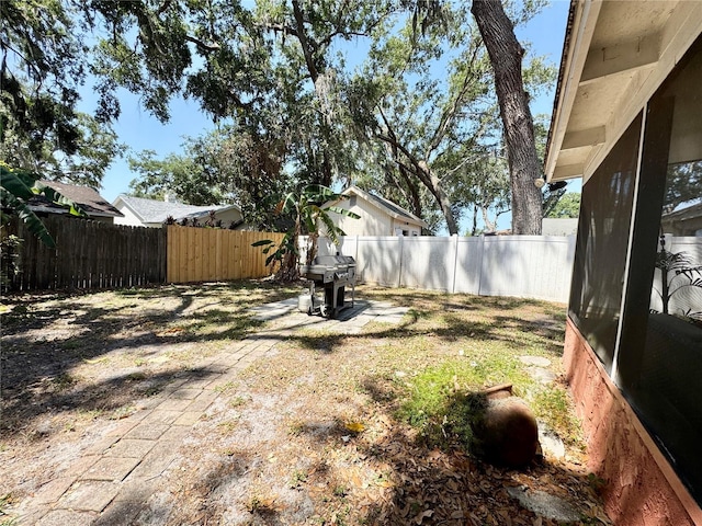 view of yard featuring a fenced backyard
