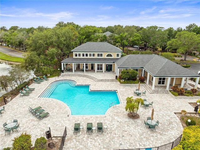 community pool with a patio