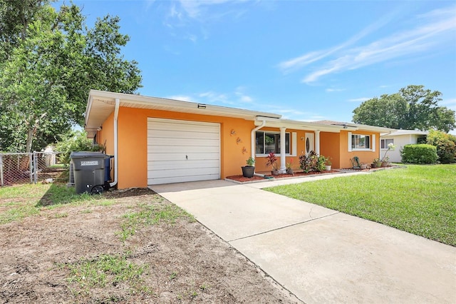 3065 Merrill Ave, Clearwater, FL 33759 - ranch-style home featuring stucco siding, an attached garage, concrete driveway, and central air condition unit