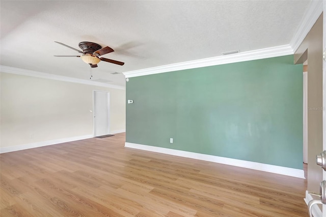 3065 Merrill Ave, Clearwater, FL 33759 - empty room featuring crown molding, a ceiling fan, light wood-style floors, and baseboards