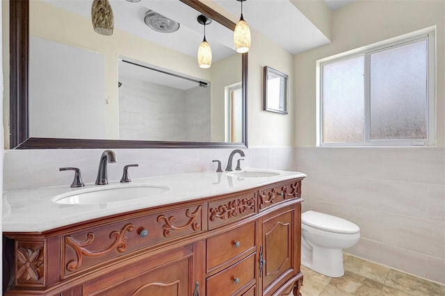 3065 Merrill Ave, Clearwater, FL 33759 - bathroom featuring double vanity and toilet