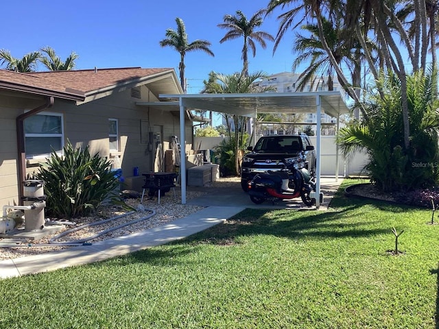 101 Madonna Blvd, Saint Petersburg, FL 33715 - exterior space with a lawn, fence, a carport, and a shingled roof