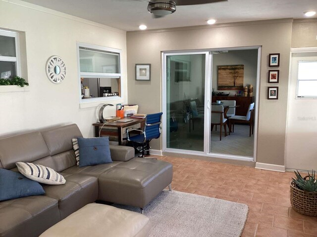 101 Madonna Blvd, Saint Petersburg, FL 33715 - living area with recessed lighting, baseboards, and ornamental molding