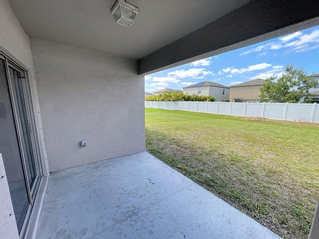 4456 Globe Thistle Dr, Tampa, FL 33619 - view of yard with a patio