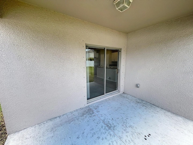 4456 Globe Thistle Dr, Tampa, FL 33619 - view of patio / terrace