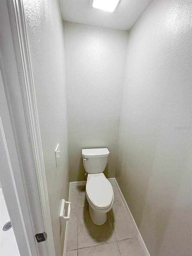 4456 Globe Thistle Dr, Tampa, FL 33619 - bathroom with tile patterned floors and toilet