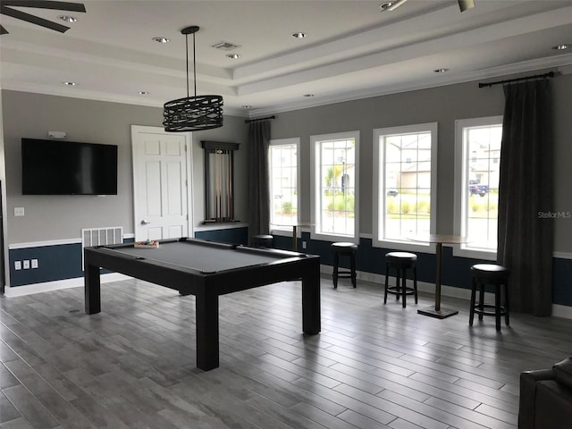 4456 Globe Thistle Dr, Tampa, FL 33619 - recreation room with pool table, wood finished floors, crown molding, a raised ceiling, and recessed lighting
