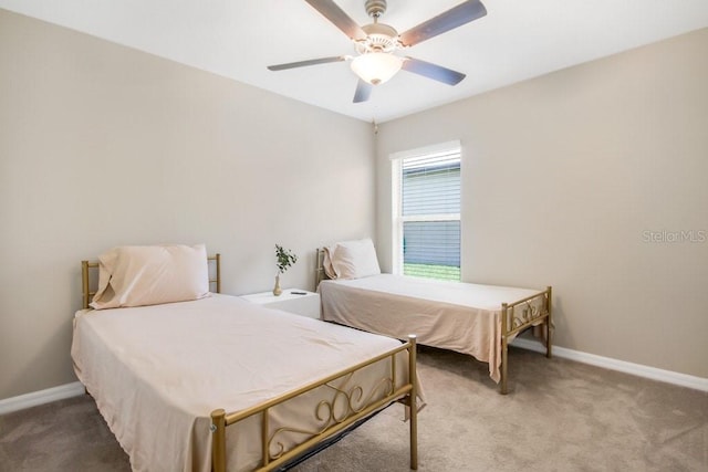 13419 Willow Bluestar Loop, Riverview, FL 33579 - bedroom featuring light colored carpet, baseboards, and ceiling fan