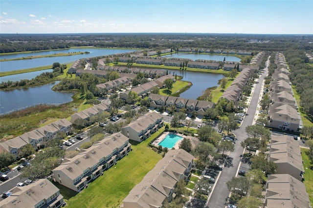 bird's eye view featuring a residential view and a water view