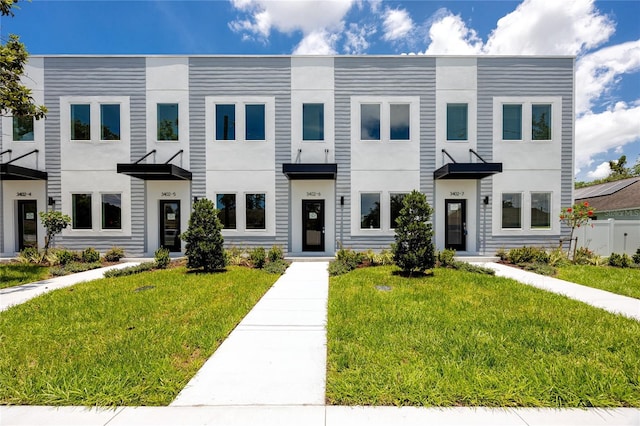 3402 E 28th Ave Unit 6, Tampa, FL 33605 - multi unit property featuring a front yard and stucco siding