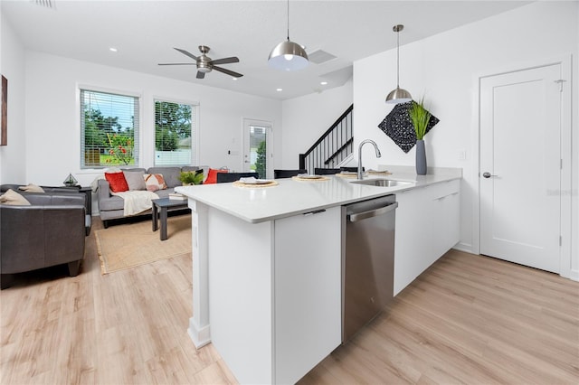 3402 E 28th Ave Unit 6, Tampa, FL 33605 - kitchen with dishwasher, light wood finished floors, light countertops, and recessed lighting