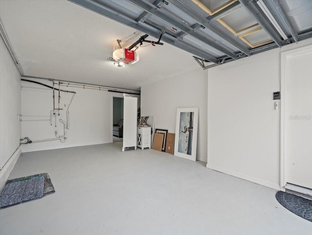 619 2nd St Unit 3, Indian Rocks Beach, FL 33785 - garage featuring a garage door opener
