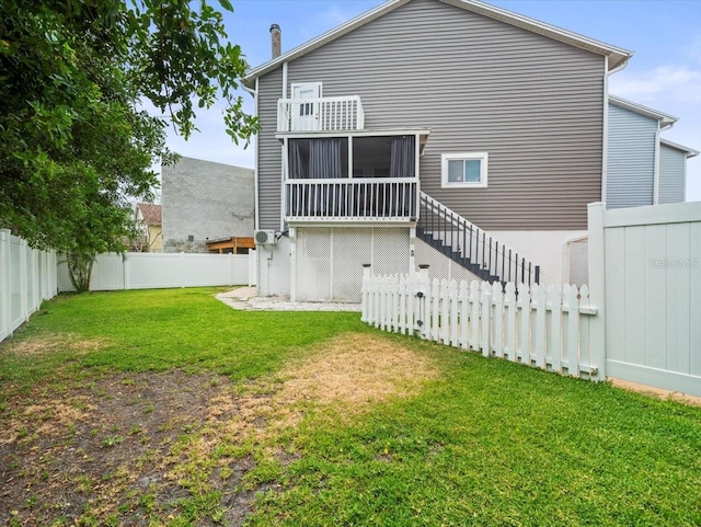 619 2nd St Unit 3, Indian Rocks Beach, FL 33785 - rear view of property featuring stairway and a sunroom
