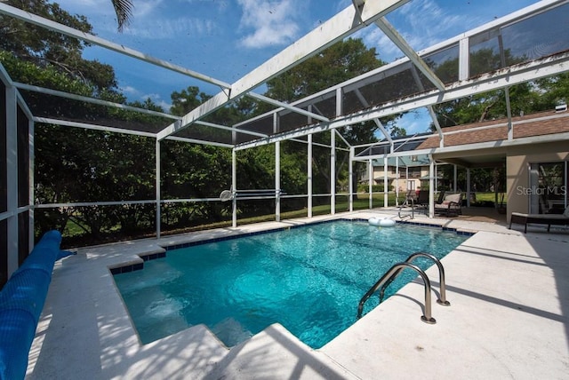 pool featuring a patio area and a lanai