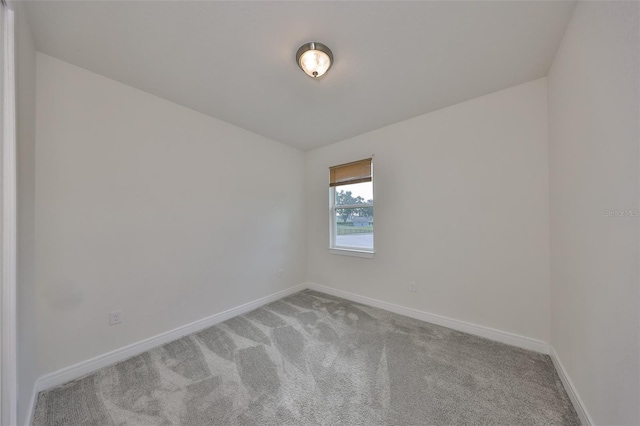 36959 Highland Meadows Ct, Zephyrhills, FL 33542 - spare room featuring light colored carpet and baseboards