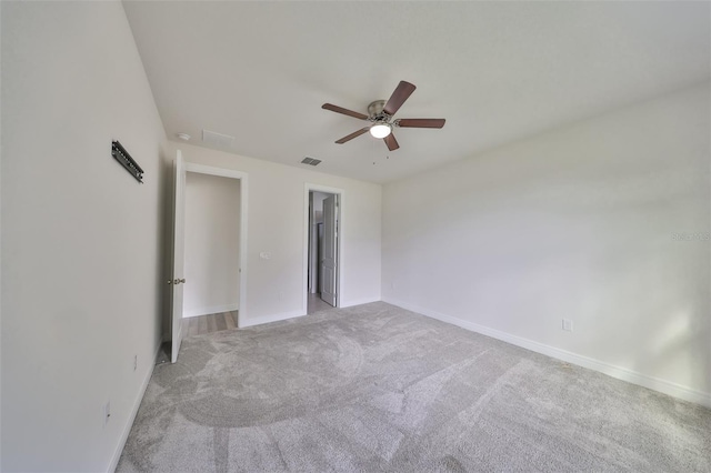 36959 Highland Meadows Ct, Zephyrhills, FL 33542 - unfurnished bedroom with carpet flooring, baseboards, and a ceiling fan