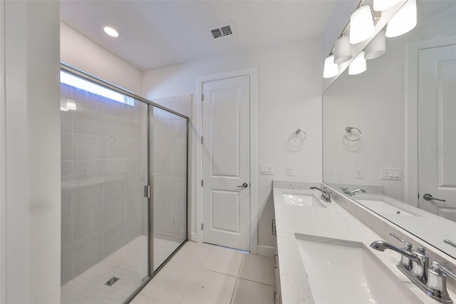 36959 Highland Meadows Ct, Zephyrhills, FL 33542 - bathroom with a shower stall, tile patterned floors, and double vanity