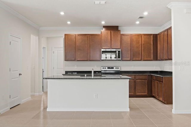 2477 Water Willow Dr, Lutz, FL 33558 - kitchen featuring stainless steel appliances, light tile patterned floors, crown molding, baseboards, and a kitchen island with sink